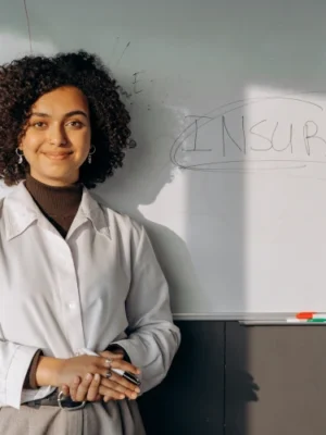 beautiful-girl-stand-beside-white-board beautiful-girl-stand-beside-white-board