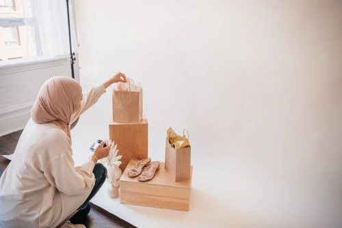 Woman-Setting-Up-the-Items-on-the-Studio-online-shopping-bareed.us